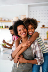 Wall Mural - caring african american mother hugging teenage daughter, enjoy moment of love, motherhood concept