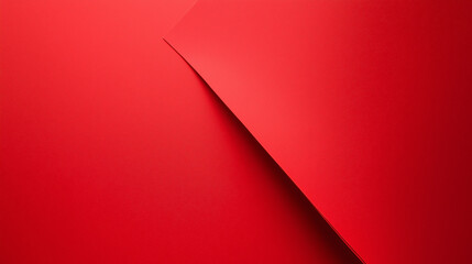 Wall Mural - Bold red paper folded sharply, casting shadows that highlight its clean lines.