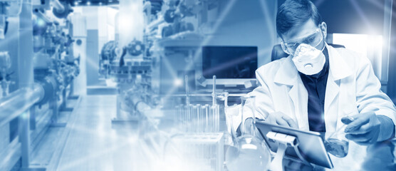 Poster - Man laboratory assistant in white coat. Scientist holds flask. Man works in pharmaceutical factory. Laboratory assistant sits at table with tablet. Pipes of industrial production near scientist