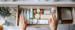 © doraclub - Casual Tossing of Skincare Products into Messy Drawer Environment Depicting Lazy Beauty Habits