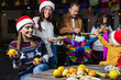© Marcos - Mexican Family celebrating traditional party or posadas for Christmas eve and holidays in Mexico Latin America