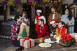 © Marcos - Mexican Family celebrating traditional party or posadas for Christmas eve and holidays in Mexico Latin America