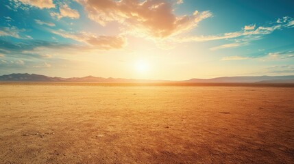 Sunlit desert landscape with a dramatic sky and vast open space, ideal for copy space. No people