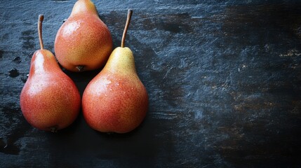 Wall Mural - Fresh pears on dark wooden background