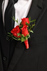 Canvas Print - Groom in suit with stylish boutonniere, closeup