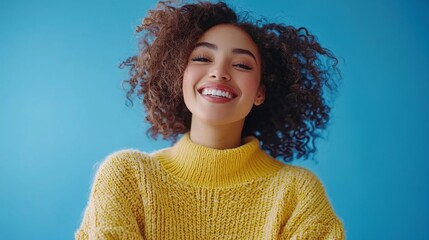 middle age woman plus size smiling on blue shirt