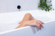 © Wavebreak Media - Relaxing in bathtub, woman enjoying spa day at home with bubbles