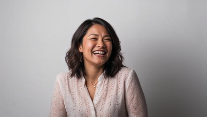 Wall Mural - Amused woman in plain white background