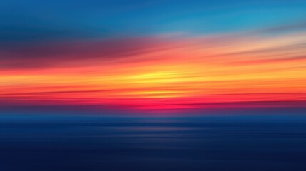 Dynamic horizon with vibrant sunset hues gently blurred across the sky, creating a smooth transition of warm and cool tones for a peaceful effect