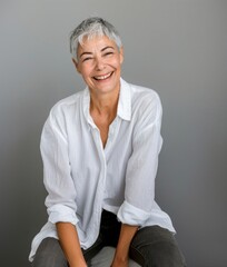 Poster - Smiling mature woman white shirt