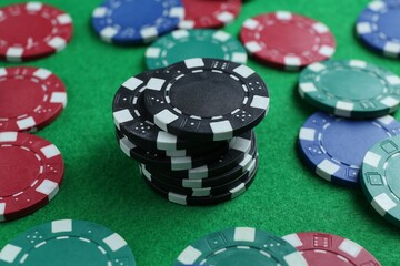 Poster - Group of poker chips on green table, closeup