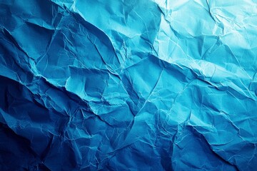 Wall Mural - Close-up of Crumpled Blue Paper with Light Reflection