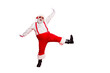 © deagreez - Full size photo of cheerful fat overweight style stylish trendy santa claus with big funny belly shout raise hands legs dance wearing trousers pants eyewear eyeglasses isolated over red background