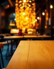 Wall Mural - Wooden tabletop with a bokeh background of a restaurant with christmas decorations