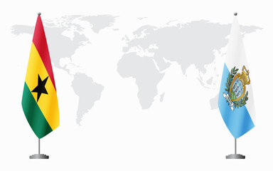 Ghana and San Marino flags for official meeting against background of world map.