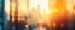 © Nadia Do - Blurry panoramic photo of a cityscape with golden lights at sunset, abstract urban background