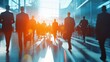 © Business Pics - long exposure shot of a crowd of business people walking in a bright office lobby, fast-moving with blurriness. Generative AI