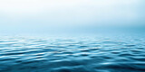 The image is of a calm body of water with a blue color