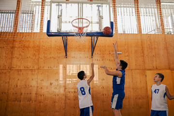 Sticker - Kids playing basketball in indoor court