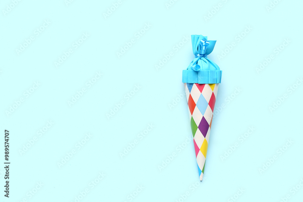 School cone on blue background