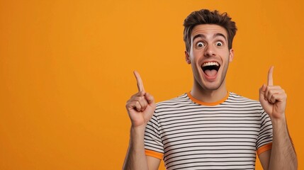 Photo of attractive guy hold hands fingers direct up empty space excited good mood sales person wear striped t-shirt isolated bright orange color background.