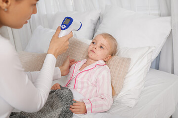 Sticker - Little girl ill with chickenpox and her mother measuring temperature in bedroom