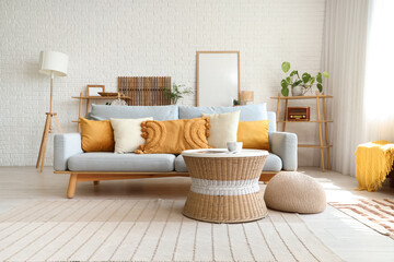 Poster - Interior of modern light living room with sofa and table