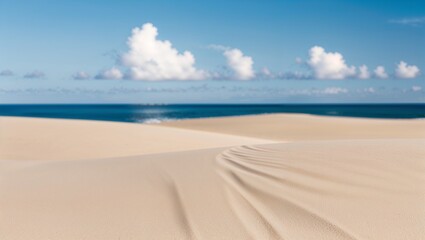 Wall Mural - The foreground is dominated by smooth, light beige sand with gentle undulations, creating a sense of calm and tranquility