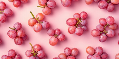 Poster - Fresh ripe grapes scattered on a soft pink background. These juicy fruits are perfect for healthy snacks and delicious recipes. A vibrant and playful style. AI