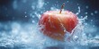© Jane Studio - A vibrant red apple submerged in a refreshing splash of water, capturing the essence of purity and revitalization.