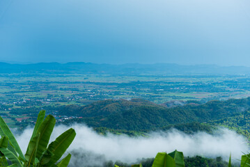 Beautiful Mountain landscape foggy windy mountain range green landscape asian farm. Amazing Landscape mountain green field meadow white cloud blue sky on sunrise. Countryside sunlight heaven scenery