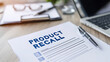 © Vanessa - Formal product recall notification letter placed on an office desk alongside a pen and laptop. Automotive,pharmaceutical,electronics,corporate,enterprise,corporation,serious,safety action concept.AI