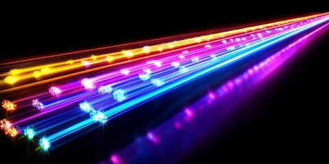 Abstract lines of neon light streaks in a variety of colors, creating an array of vibrant patterns against a dark background.