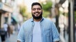 © gn8 - Confident Young Arab Man in Urban Street, Smiling, Casual Denim Outfit Diverse Lifestyle and Fashion Concept