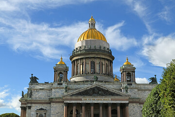 Golden domes of Saint Isaac's Cathedral (1858), Russian Orthodox cathedral on sunny summer day. St Petersburg, Russia