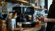 © Bussakon - Barista Customizing Drinks with Smart Coffee Machine and Monitoring App