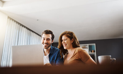 Poster - Finance, couple and happy with laptop in home for mortgage investment, budget savings and planning. People, technology and smile at dining table for good credit score and loan application success