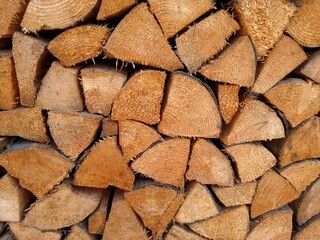 Firewood chopped dry wooden logs woodpile stacked horizontal