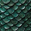 © VISUAL BACKGROUND - A close up of a green dragon scales pattern