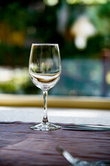 empty glass on the table on sunny day in  restaurant