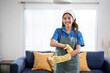 © Kawee - Portrait of Asian cleaning service woman worker working in house.