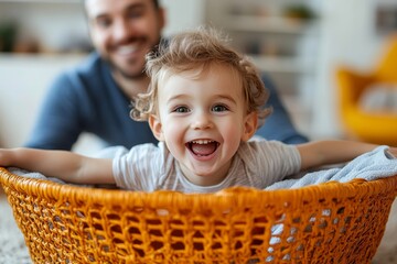 Wall Mural - Happy kid with arms outstretched has fun while father pushes him in laundry basket at home, Generative AI