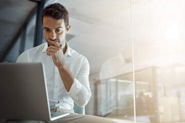 Canvas Print - Laptop, thinking and business man reading email for sales update, feedback or budget report. Serious, computer and planning, problem solving or reflection for solution or idea on glass wall in office