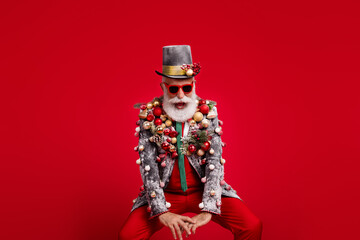 Canvas Print - Photo of happy cheerful old man dancing enjoy party wear christmas tree balls costume sunglasses isolated red color background