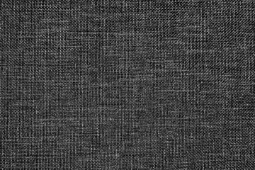 A grey woven fabric material closeup