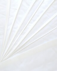 Wall Mural - A minimalist arrangement of white sheets and lines creating a serene, abstract composition.