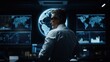 © AI Dev Studio - A person stands in a sophisticated control room, observing a digital globe displayed on multiple screens, representing technological advancement and global monitoring.