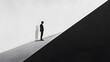 © rehan - Silhouette of a Man Standing at the Edge of a Black and White Divide