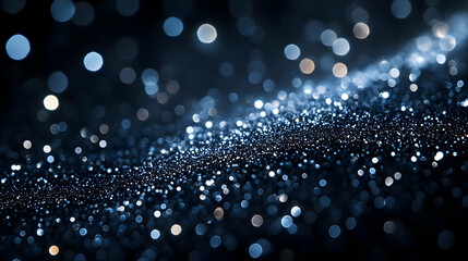 Poster - Abstract sparkling bokeh background with shimmering blue particles.