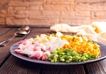 Wall Mural - A fresh crab salad, with crabs claw and crab crackers.